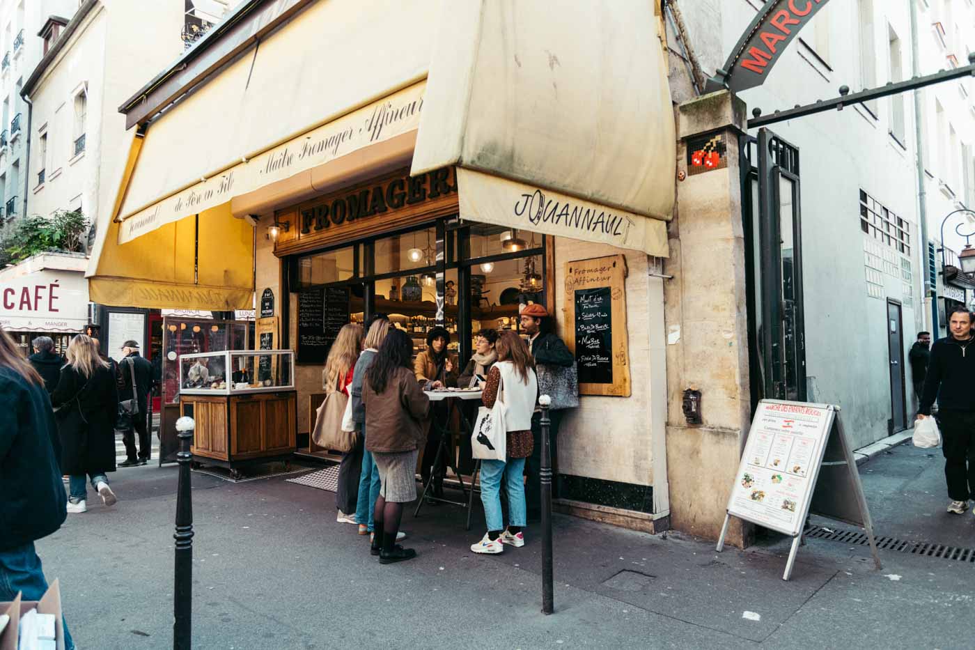 tour_group_standing_outside_Fromagerie_Jouannault_Paris