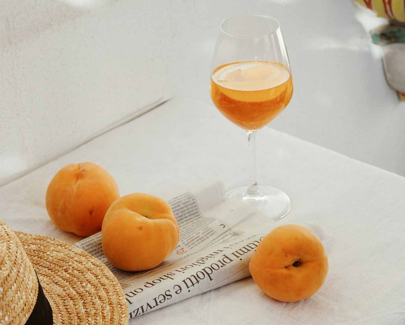 orange_wine_with_newspaper_seville